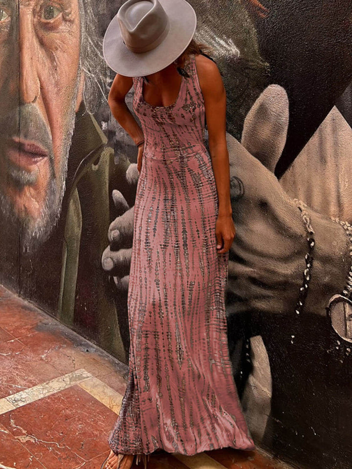 Vestido largo elástico con cordones y estampado en la espalda, diseñado por Alessia Madrid, en tonos vibrantes.