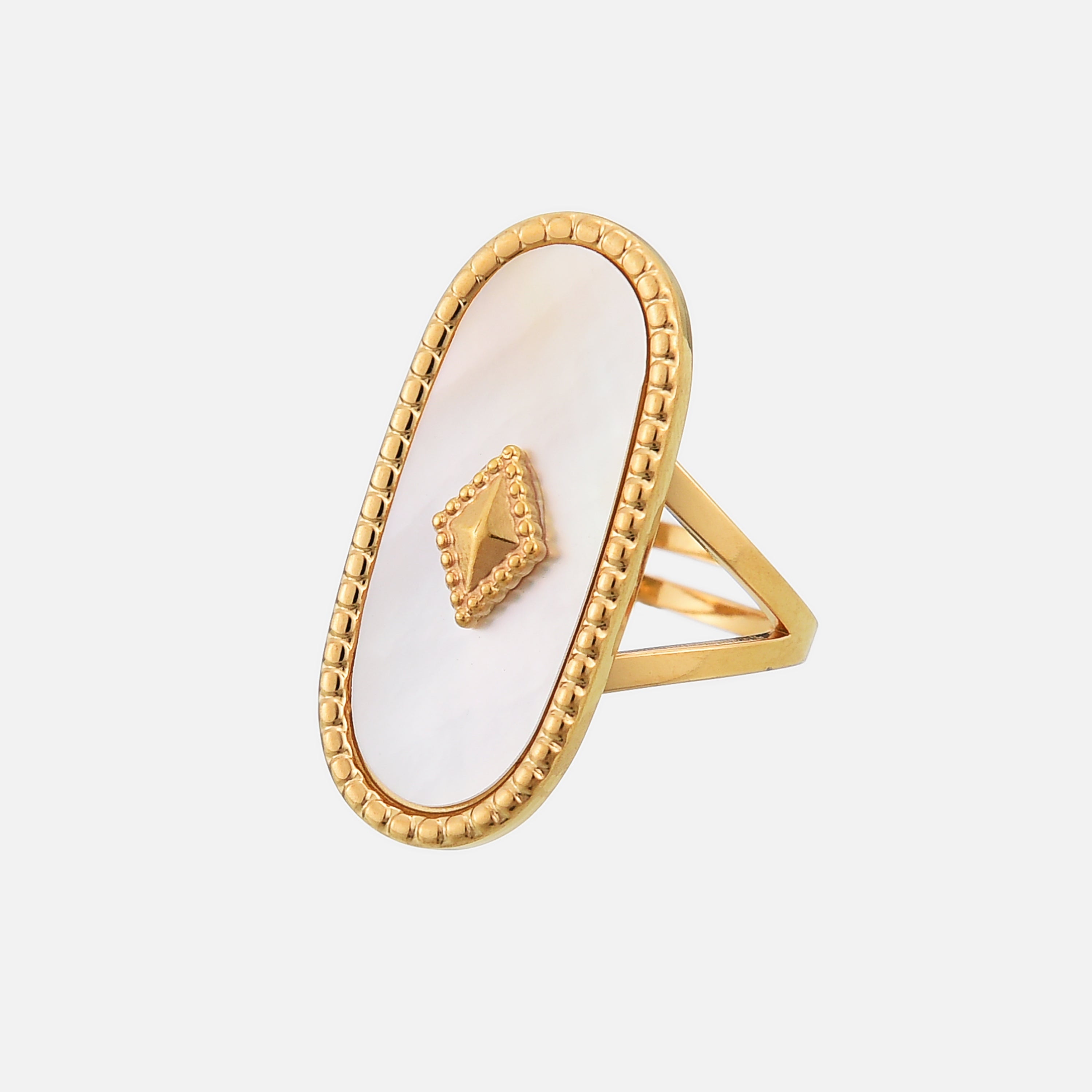 Anillo ajustable Elise de Alessia Madrid, con diseño elegante y detalles metálicos en tonos dorados.