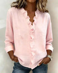 Blusa Chiara de Alessia Madrid con cuello en V y volantes delicados, tela ligera y elegante para looks femeninos.