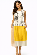 Vestido midi Leah de Alessia Madrid con lunares y bloques de color, diseño elegante y moderno, en tonos vibrantes.