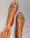 Sandalias de tiras metalizadas Alessia Madrid, con suela y diseño elegante visible en la imagen.