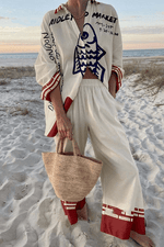 Conjunto de verano Marina de lino y algodón de Alessia Madrid, con blusa y pantalones en tonos claros.