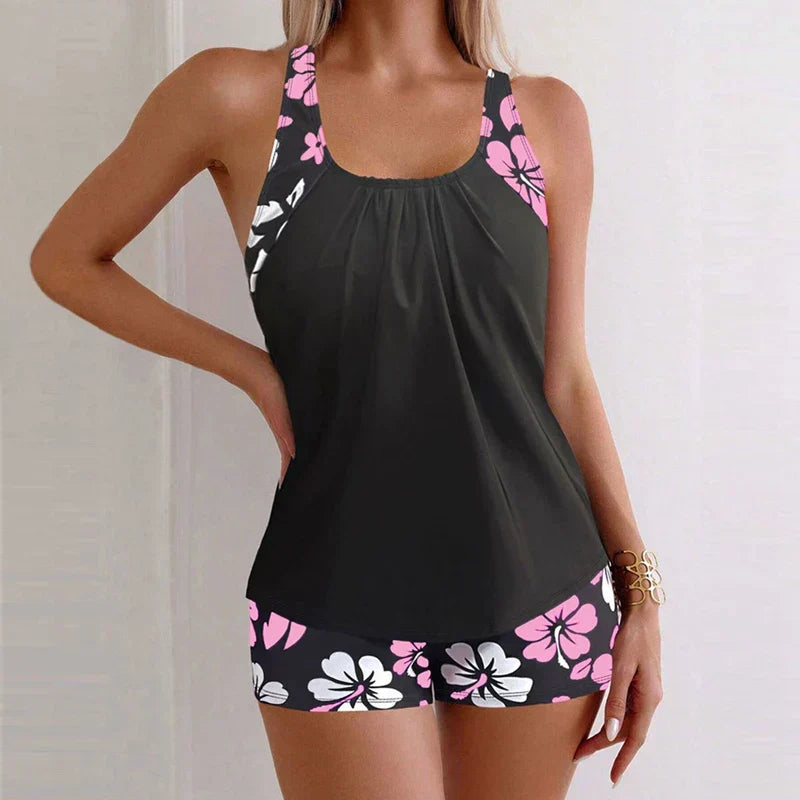 Bañador de dos piezas Ravina de Alessia Madrid con estampado floral en tonos vibrantes y diseño elegante para playa o piscina