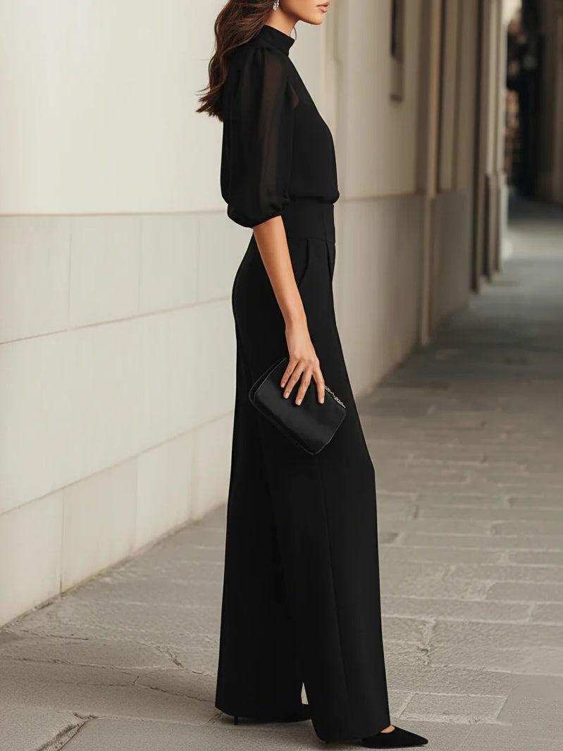 Conjunto de tres piezas en negro Valentina de Alessia Madrid, top y pantalones de pierna ancha, estilo elegante y moderno.