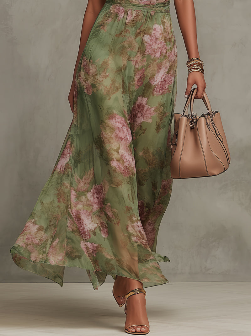 Vestido largo verde con estampado floral y cuello halter de la marca Alessia Madrid.