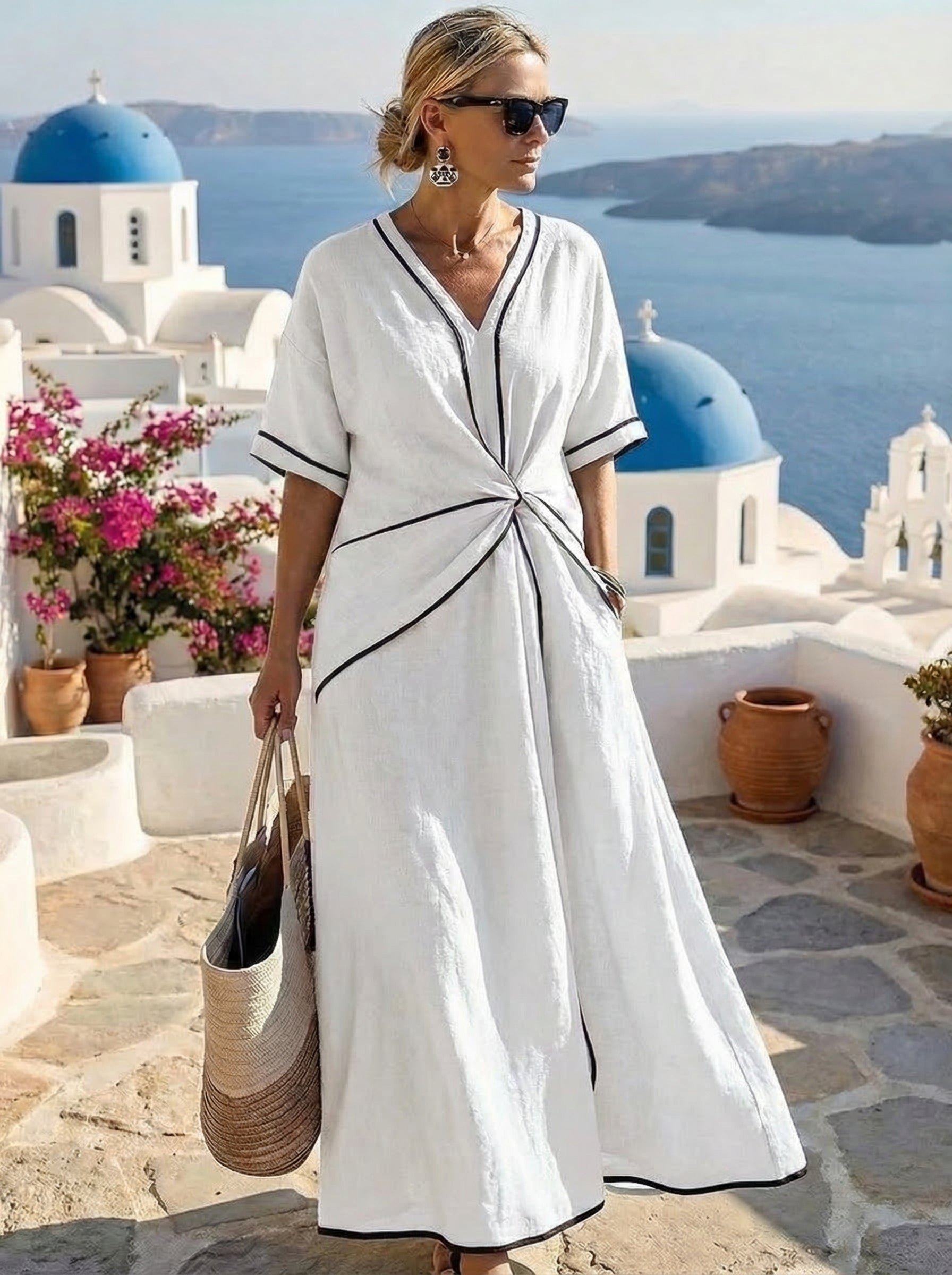 Vestido de verano Noah de Alessia Madrid, estilo Santorini, con detalles florales y corte ligero perfecto para el verano.