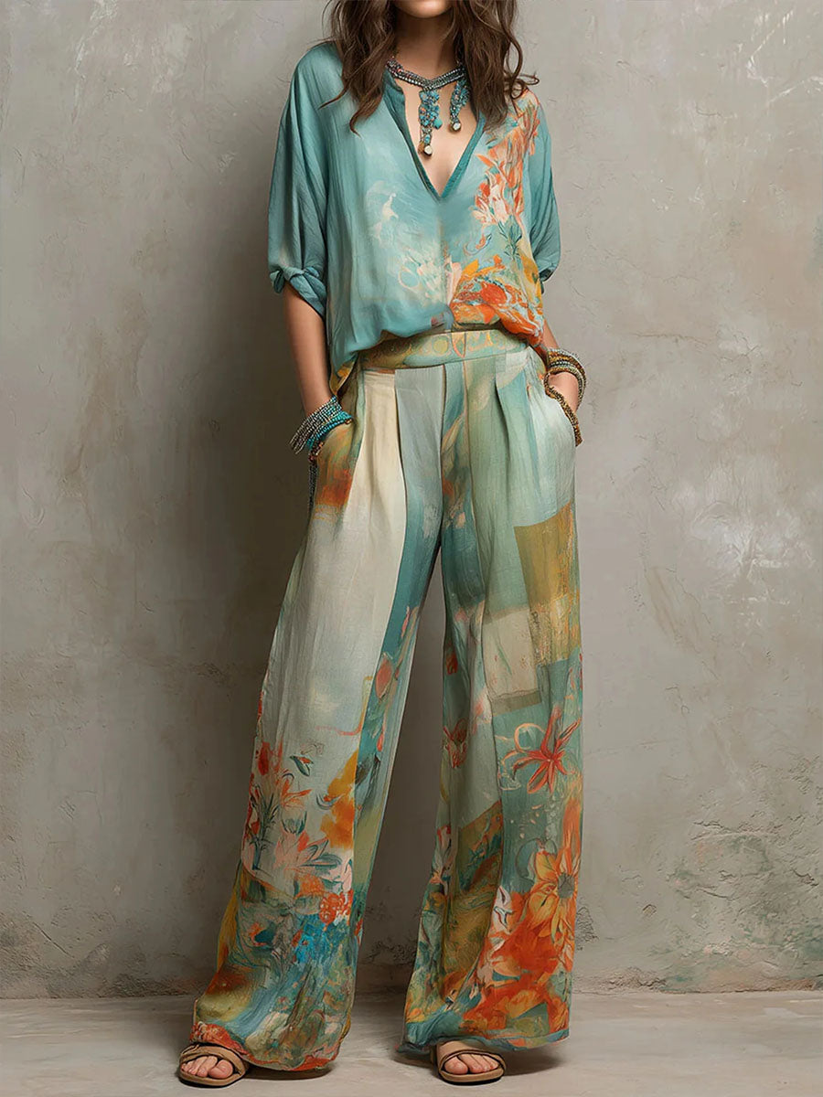 Conjunto elegante Chiara de Alessia Madrid con estampado floral y pantalones anchos, ropa moderna y femenina en tonos vivos.