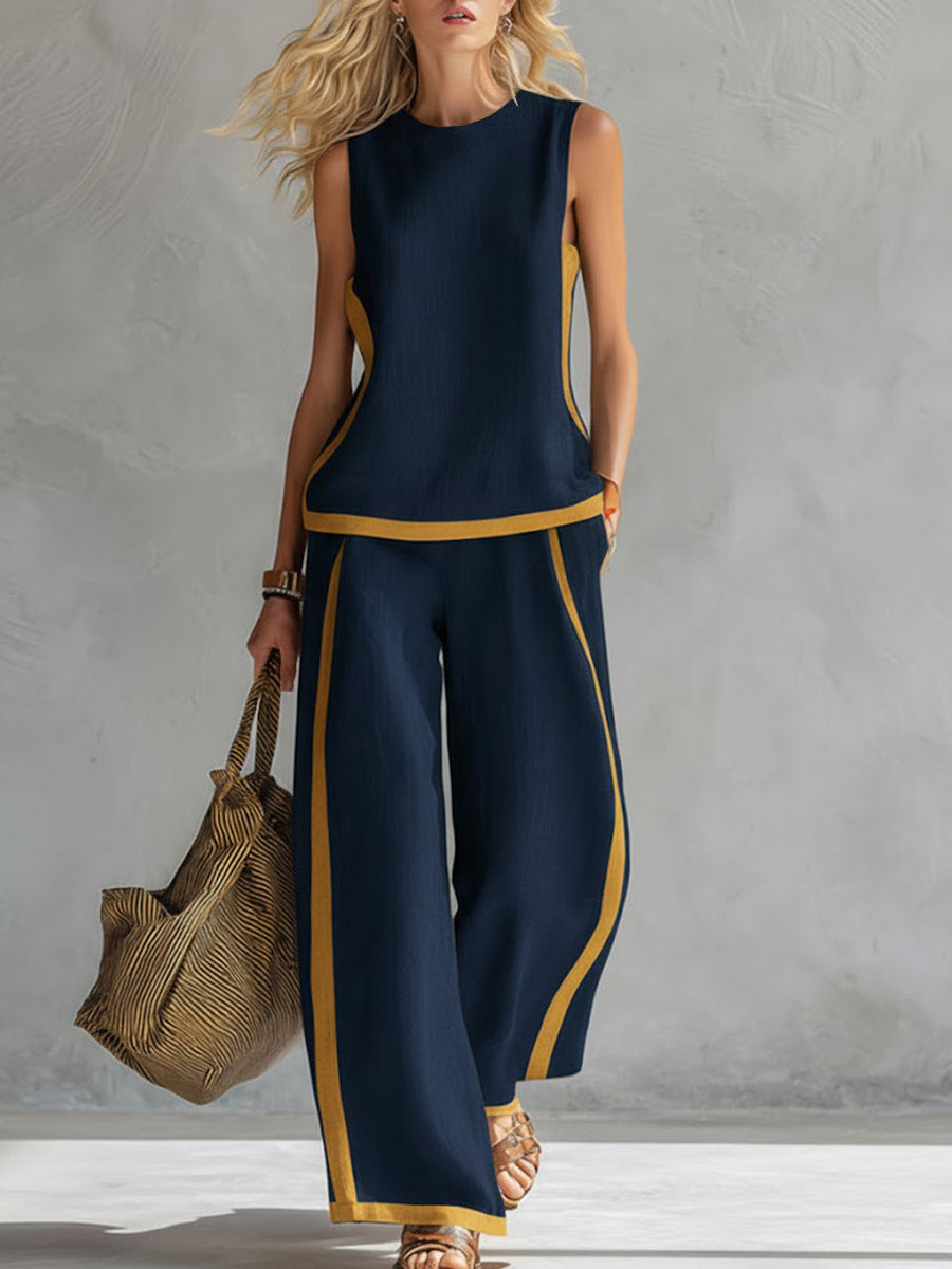 Conjunto deportivo Alessia Madrid Giovanna de dos piezas, con top y pantalón elegante en tela cómoda y moderna.